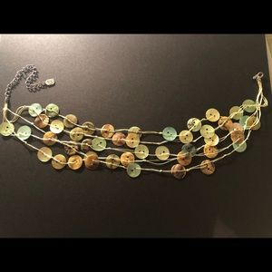 Fun piece. One of a kind. Goes with any outfit.